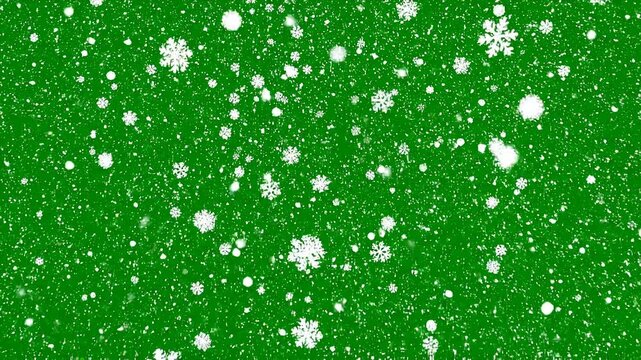 Animated falling white snowflakes on green screen background for Christmas and winter holiday video editing and visual effects projects