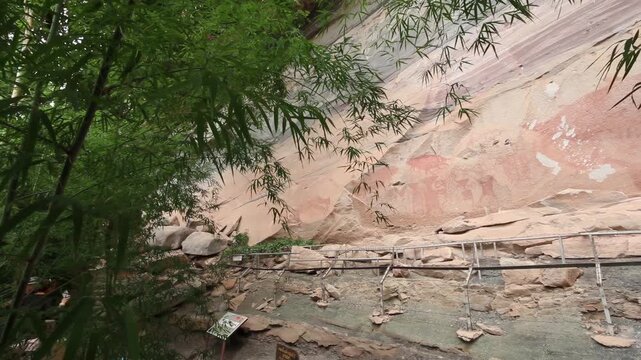 Ancient prehistoric cliff rock painting at Pha Taem National Park, Ubon Ratchathani, Thailand.