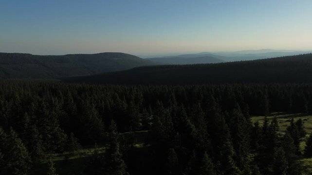 Aerial view of Voseck&aacute; bouda mountain shelter bathed in golden hour light, Karkonosze Mountains