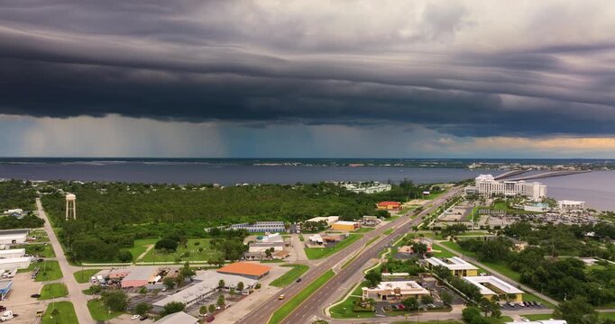 Rainstorm over Charlotte Harbor in Florida. Heavy precipitation with moving and changing stormy cloudscape.