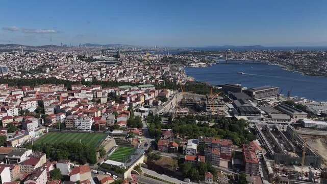 Stunning Aerial View of the Golden Horn in Istanbul.  A high-angle drone photograph capturing the historic Golden Horn (Hali&ccedil;) estuary in Istanbul, Turkey. The image showcases the iconic bridges.