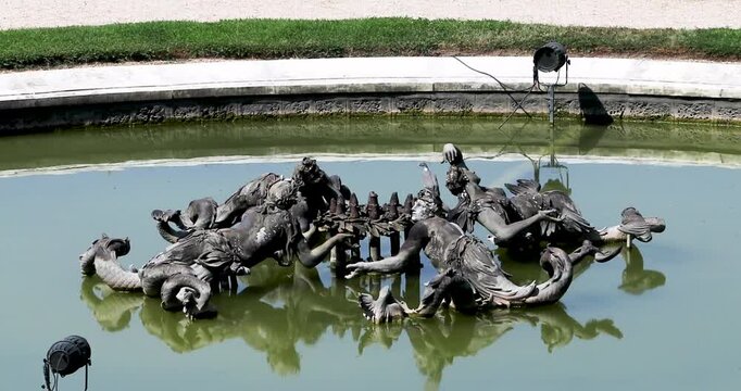sculptural composition of the Crown Pool in Versailles, view from above on a hot day, August 18, 2026