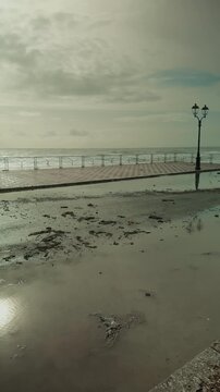 Flooding from a strong storm surge the morning after the storm on a seafront