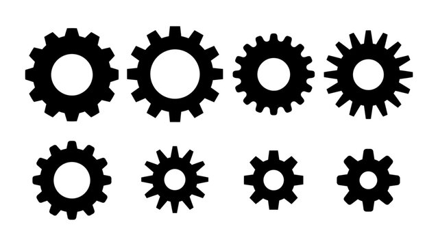 Set of black gear icons of various sizes and tooth counts