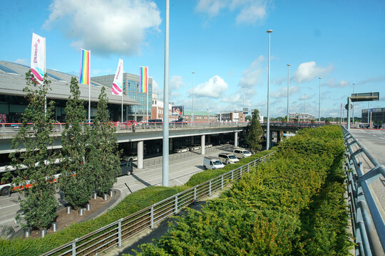 Hamburg GE, August 20, 2023: Gardening at Airport of Hamburg  and Radisson ay background with rainbow flags