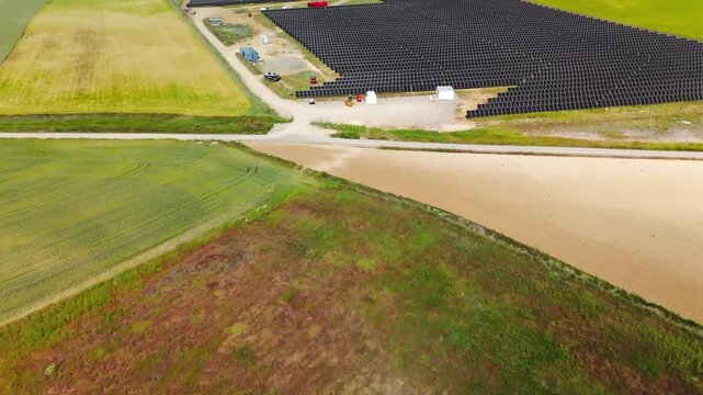 Top-down drone view of solar panel rows in Avila Spain