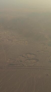 Aerial view of arid desert landscape with mysterious geoglyphs.Egypt. 