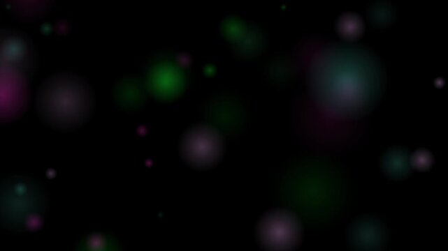 Floating bokeh lights drift gently across a dark background in shades of green, purple, and pink.