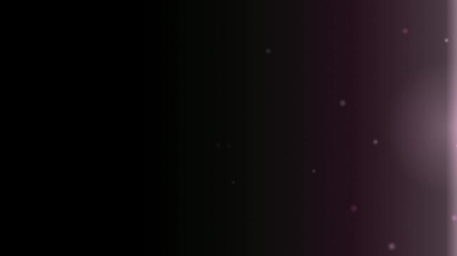Soft pink bokeh lights float gently across a deep black background.