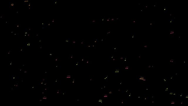 Numerous small colored lights dot the dark night sky creating a starry pattern of red green and white points of light