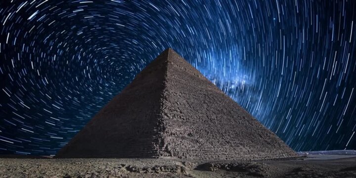 pyramids and pyramids of giza, egypt night shot of a pyramid of the moon in a dark starry sky