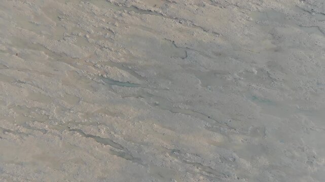 Top Down Aerial Drone Shot of Wet Mudflat Sand Ripple Texture at Pantai Murni Video