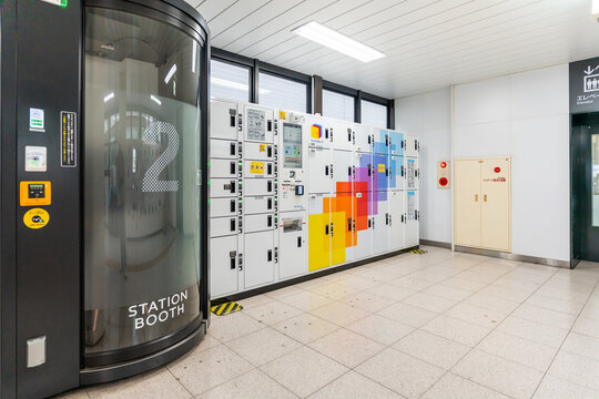 Modern work booth and coin lockers at Harajuku train station Tokyo Japan