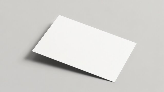 Blank white paper card mockup on grey background