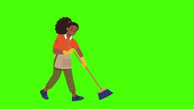 Young woman sweeping with broom on green screen. 4K Video