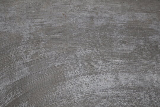 Natural cement wall texture showcasing raw surfaces, rough patterns, and minimalist architectural character.