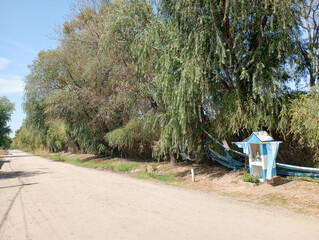 A shrine in honor of Diego Maradona at the back of the Jardin de Paz cemetery. © masar1920