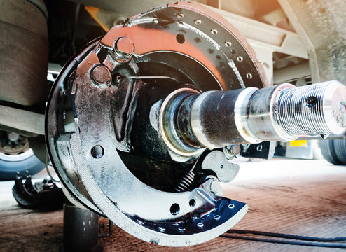 Disk brake truck trailer, brake pads, truck axles. semi trailer truck wheels repair. freight transportation