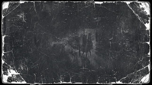 A black distressed book cover with worn edges and scratched texture surface for background design with grungy