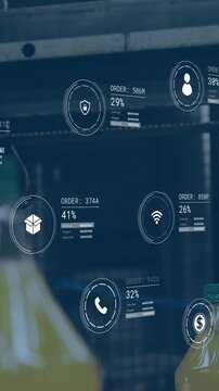 Animation of data processing against modern machinery operating at a factory