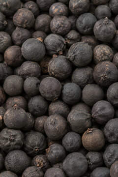 Whole Dried Black Limes Loomi Natural Spice Background