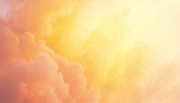 Golden hour sky with soft orange and yellow clouds creating serene atmosphere for calm concept