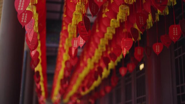 Asian culture and traditions, notes in chinese temple, wishes and predictions. Celebrate religious fest in China, chinese New year, make wish and dream on, traveling and tourism in Asia, details shot