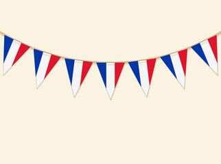 Obraz premium French flag bunting garland featuring blue white and red tricolor triangular pennants hanging on a rope over a neutral cream background for Bastille Day or national celebrations.