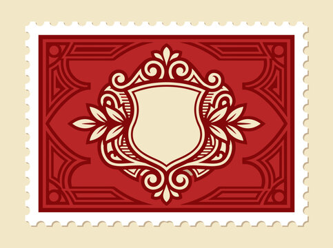 Vintage red postage stamp featuring an ornate cream heraldic shield blank crest with decorative filigree scrolls floral elements and symmetrical geometric border pattern illustrations.