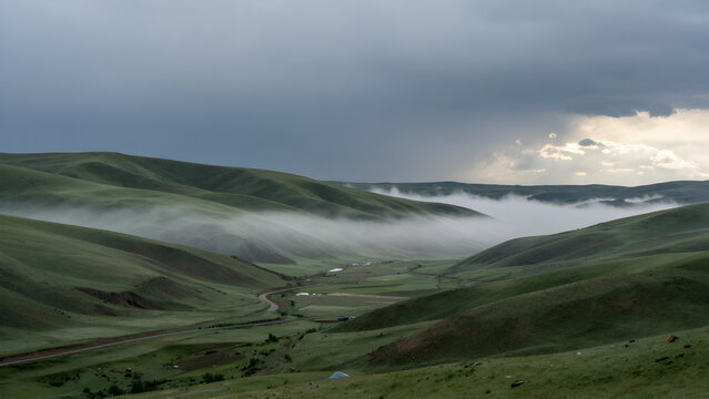 Misty green rolling hills under dramatic cloudy sky