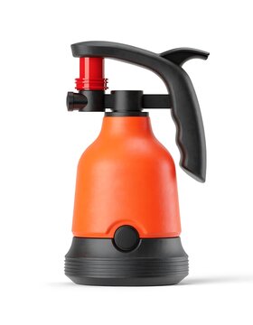 Portable orange and black plastic pressure garden sprayer isolated with watering