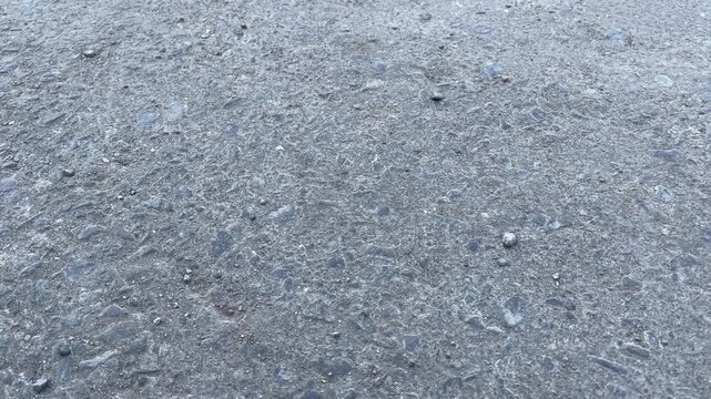 Rough aggregate concrete surface texture background