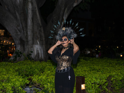 Catrina Woman Wearing a Large Crown at a Day of the Dead Celebration