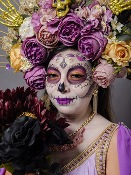 Portrait of Woman With Day of the Dead Makeup and Floral Crown