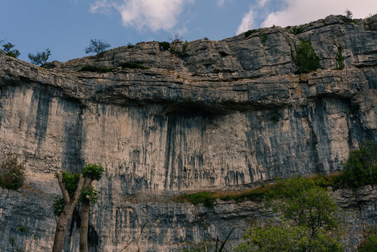 Malham Cove, a dramatic limestone cliff in Yorkshire Dales National Park, North Yorkshire, England, UK - 4 September 2026.
