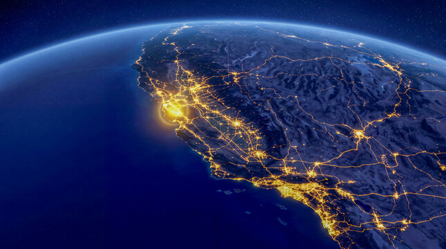 View of the western United States at night showing city lights and landscape from space