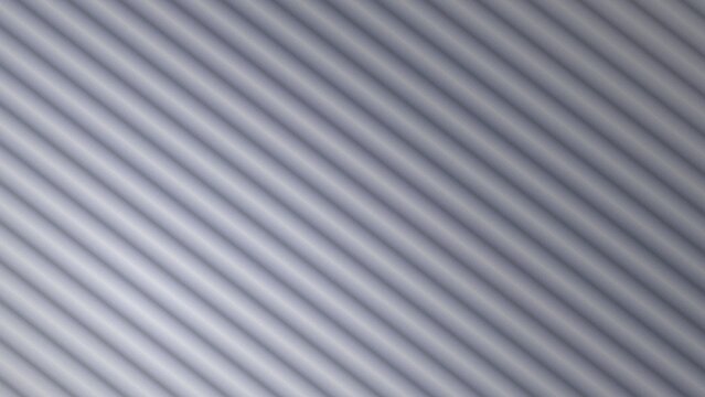 Gray ribbed pattern fills the frame with diagonal lines