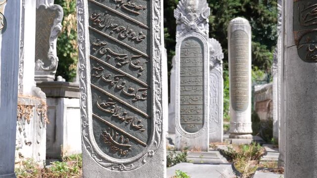 Ancient Ottoman gravestones with Arabic calligraphy in Istanbul cemetery