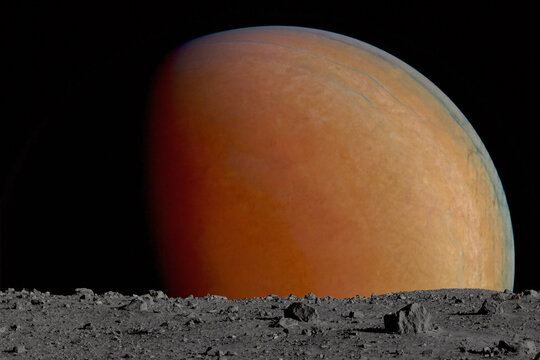Orange planet Mars rising above barren cratered moon landscape