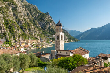 Obraz premium Old town harbor and lakefront view, Limone sul Garda, Italy