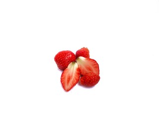 photo of a strawberry in the center isolated on a white background with copy space for commercial use. summer photo concept, fruits, and natural freshness © AisPict