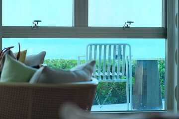 Living room looking out to balcony with ocean view