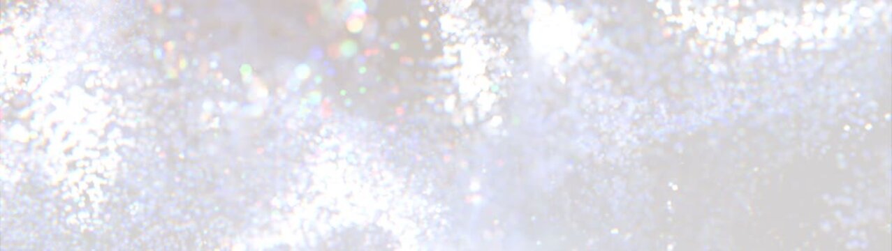 Soft abstract bokeh with rainbow highlights, creating an atmosphere of dreaminess and lightness. 
Abstract white background with bokeh effect. Glitter lights background. 