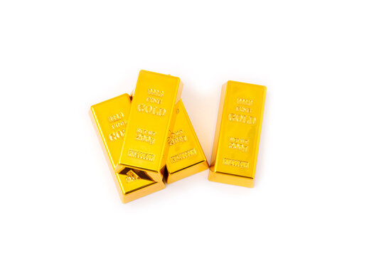 Gold bars isolated on white background. Stack of many shiny gold bars. Fine gold concept. Gold panel background.  Metallic texture. Wealth, luxury, treasure.