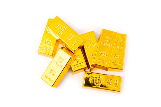 Gold bars isolated on white background. Stack of many shiny gold bars. Fine gold concept. Gold panel background.  Metallic texture. Wealth, luxury, treasure.