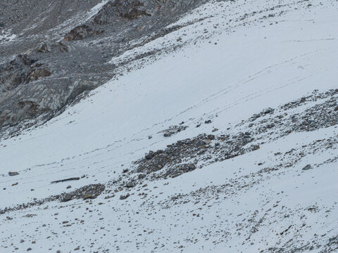 Aerial view of the wreckage of a C-124 Globemaster on the snow-covered slopes of Bomber Glacier in Matanuska-Susitna Borough, Alaska, United States.