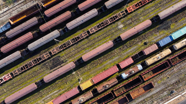 Aerial view of Train Station Zeleznik with numerous freight train cars parked on parallel tracks in Belgrade, City of Belgrade, Serbia.