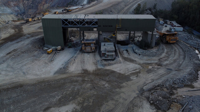 Aerial view of the RTB Bor Grupa copper mine facility with large haul trucks operating near the processing plant in Majdanpek, Borski okrug, Serbia.