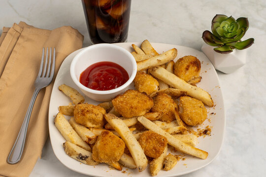 cod bites and fries  served with soft drinks