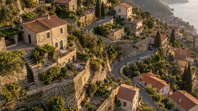 Terraced hillside homes stepping around a narrow switchback street